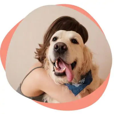 woman hugging dog