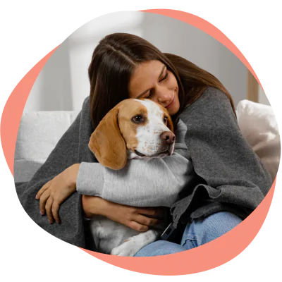 woman hugging her dog